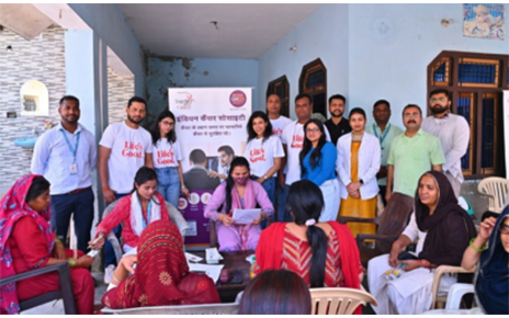 A group picture of people gathered around with LG employees and program-related people