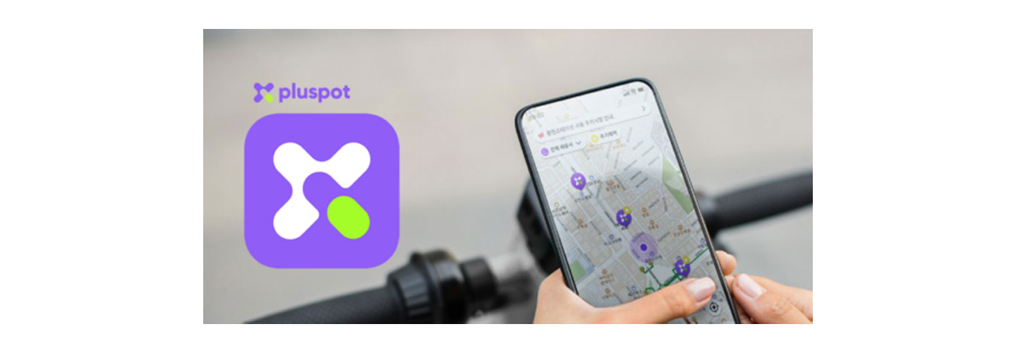 A person using the pluspot application on a smartphone