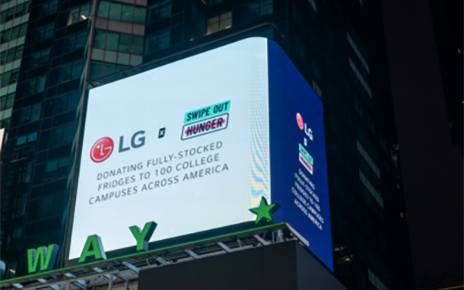A close-up photo of a billboard in Times Square, New York displaying a collaboration of LG with Swipe Out Hunger