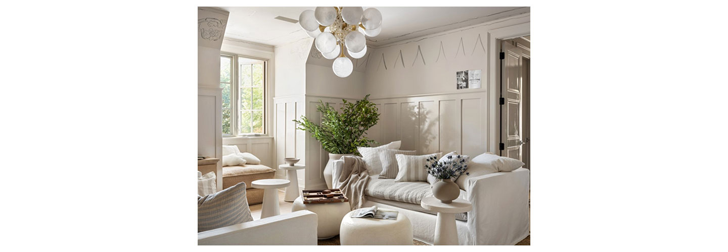 A view of the Whole Home Project’s white-themed living room.