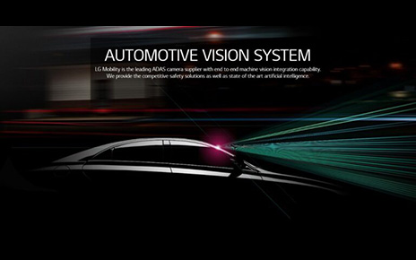 A promotional image of LG's ADAS camera with an image of a black car sending out signals from its front windshield 