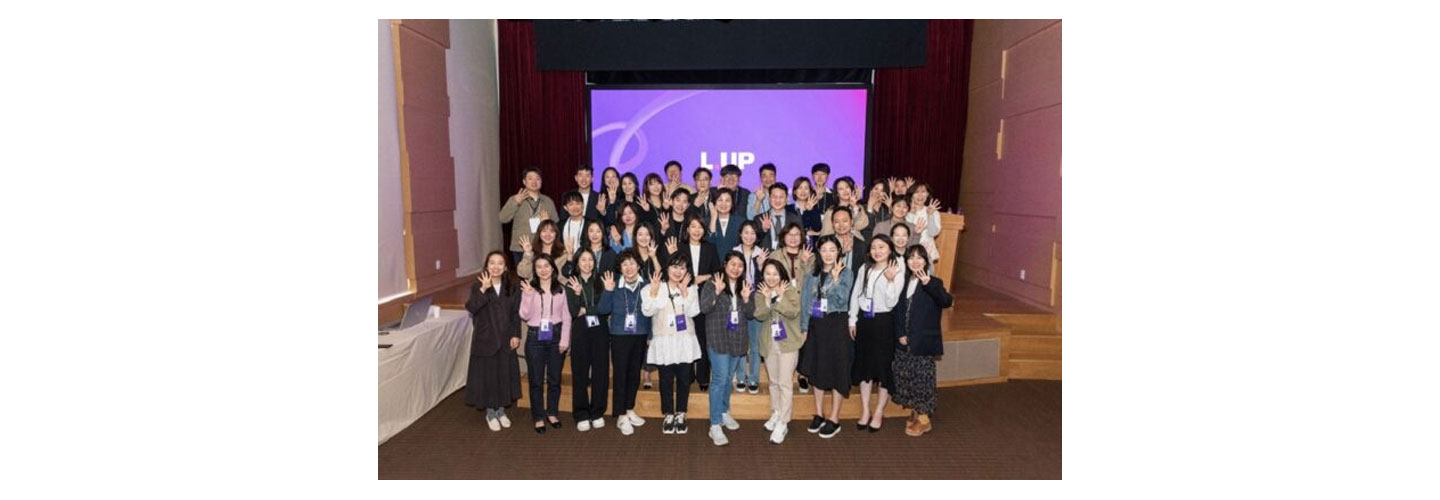 L.UP members posing together for a picture