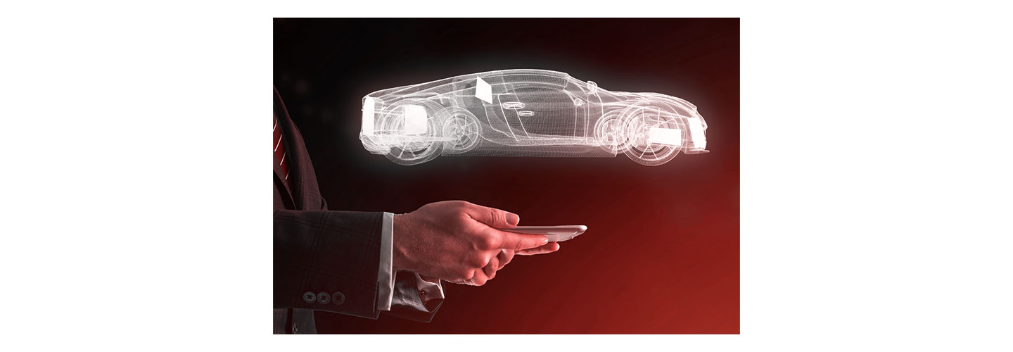 Image of a vehicle created above the human hand holding a smartphone