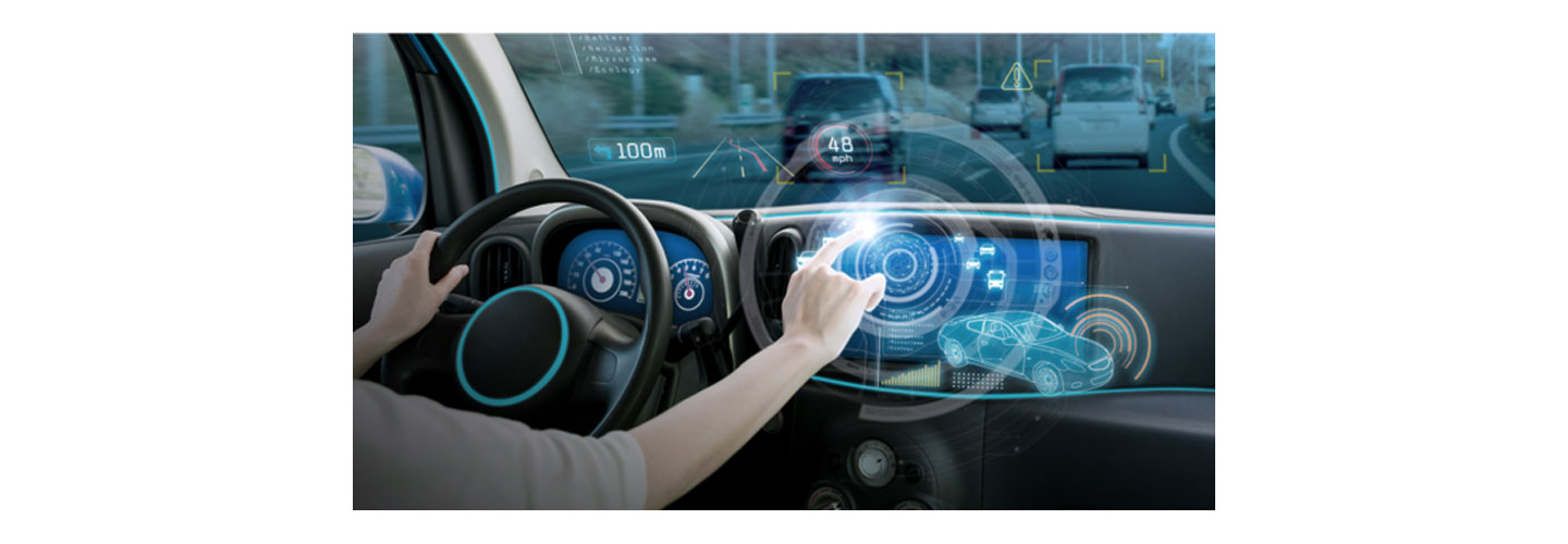 A driver using a hologram to operate the vehicle while driving