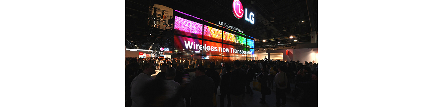 A photo of LG's booth at CES 2024 with the OLED T display