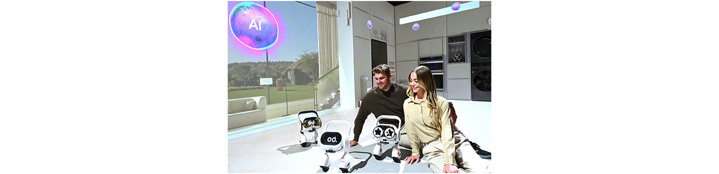 A photo of two people sitting next to the new AI Agent