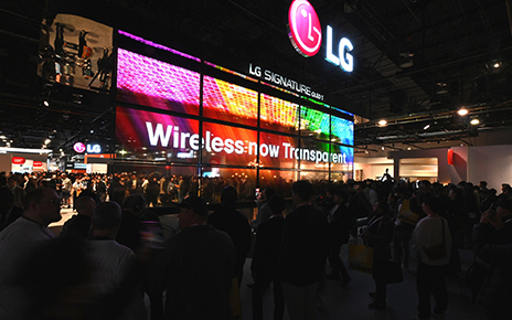 A photo of LG's booth at CES 2024 with the OLED T display