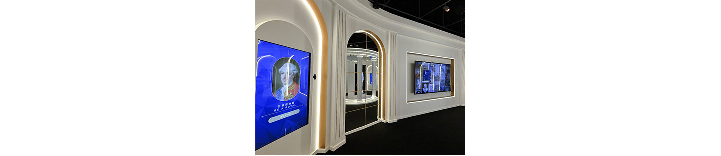 A corner of an exhibition area where various Versailles-related contents are displayed on LG screens