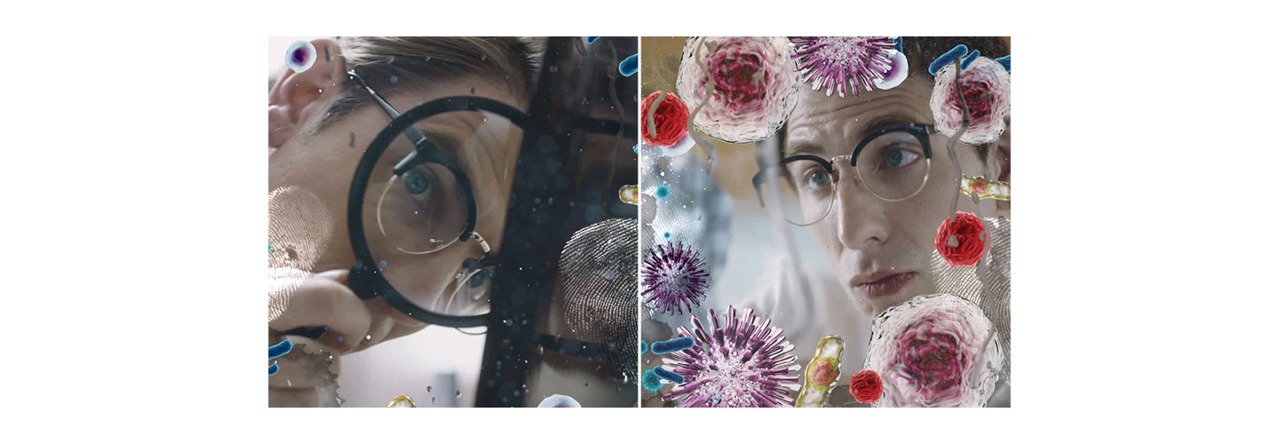 A man uses a magnifying glass to search for bacteria around his home