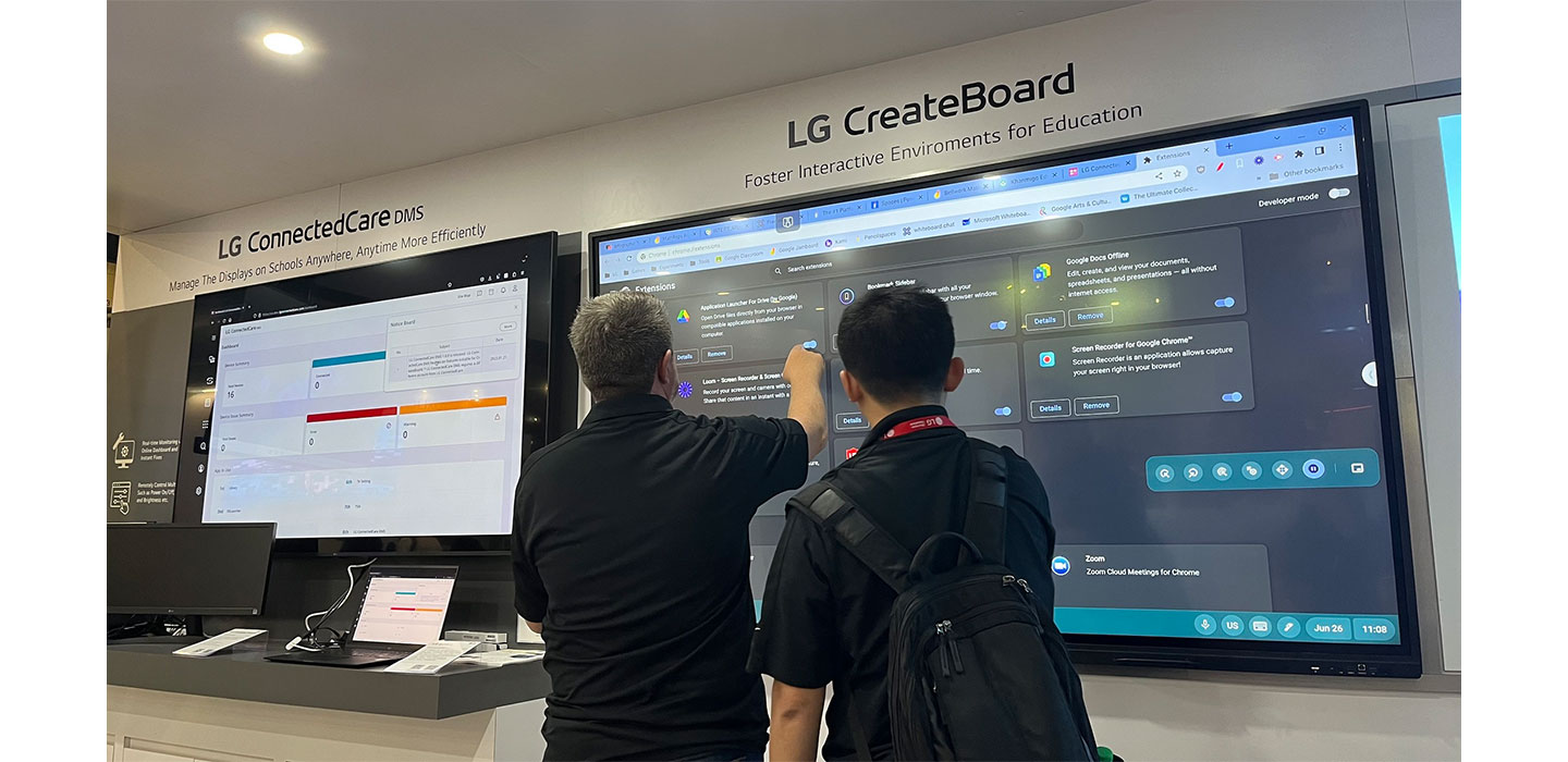 A man pointing at LG CreateBoard screen