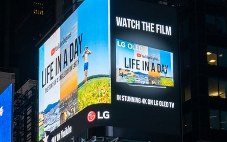 LG's enormous high-definition digital billboard in Time Square, New York, playing the YouTube Originals documentary 'Life in a Day.'