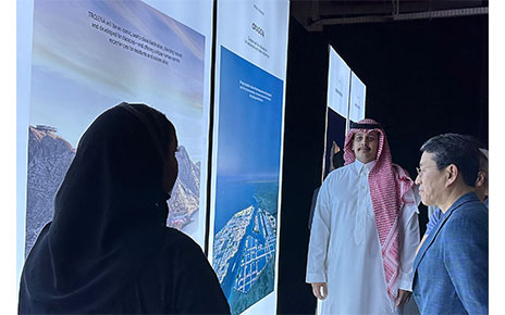 LG CEO Cho taking a look at a sign which explains NEOM City Project