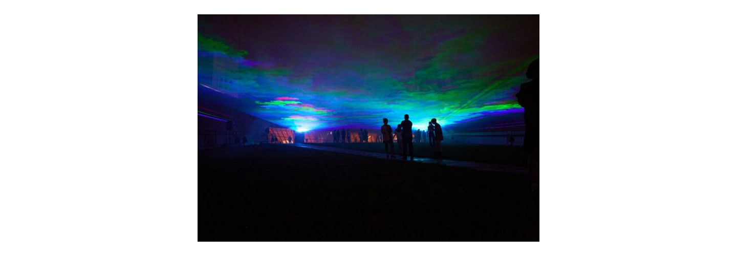 People admiring the artwork that brings the aurora borealis to Seoul Light DDP 2023