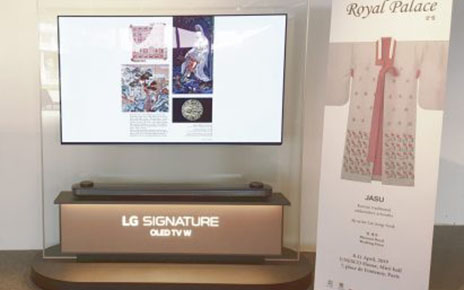 The LG SIGNATURE OLED TV W and promotional banner introduce Korea’s traditional “chasu” embroidery.