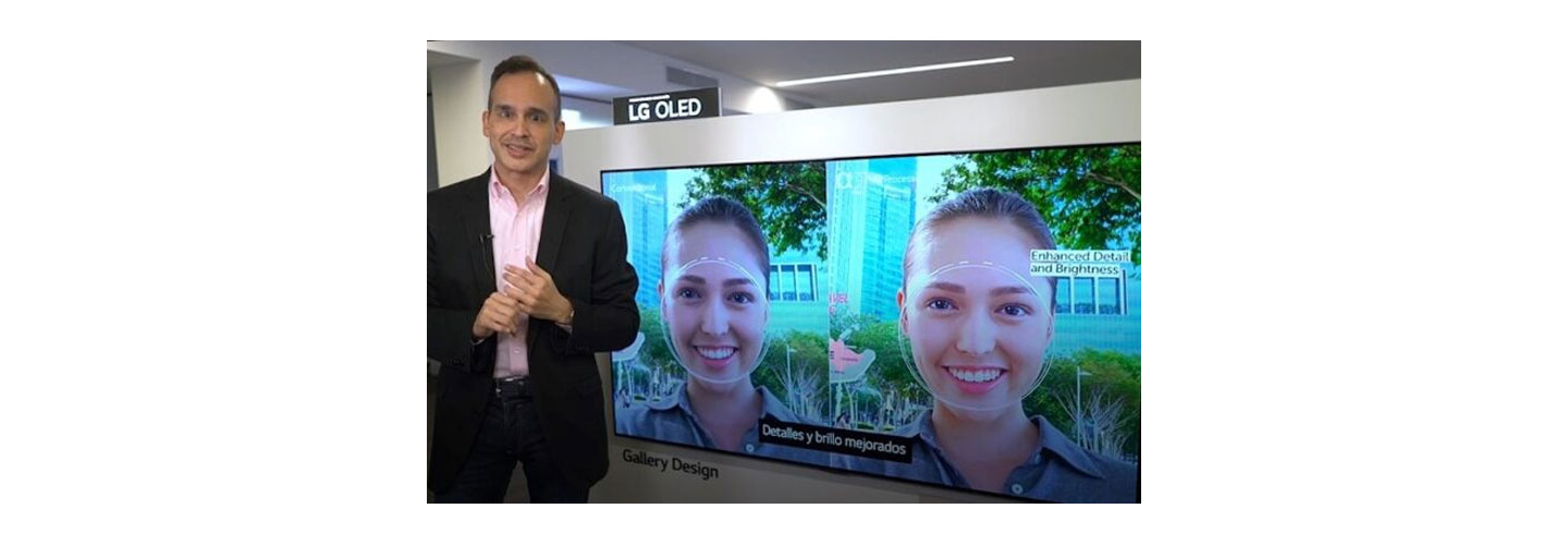  Luis Gálvez of LG stands in front of a newly launched LG OLED TV as he talks about its enhanced detail and brightness