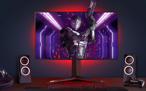 The complete gaming setup boasting an LG UltraGear™ gaming monitor which is displaying a futuristic shooting title, a controller for console play, speakers, headphones and a keyboard.