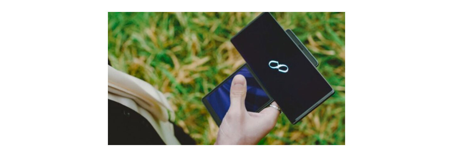 Taemin, another member of SuperM, looks at a symbol displayed on LG WING in Swivel Mode during SuperM's music video