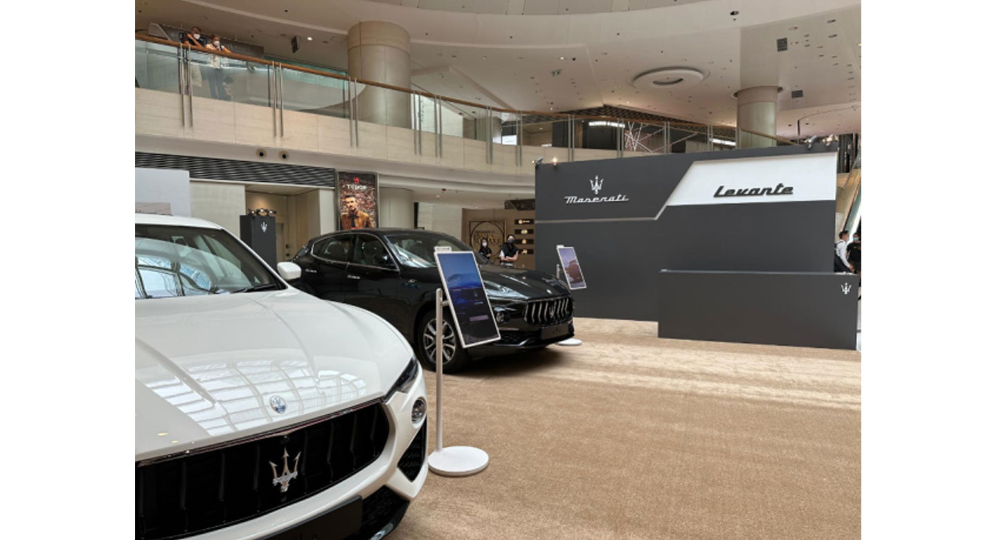 LG StanbyME installed next to the Maserati's luxurious automobiles at Maserati showroom in Hong Kong