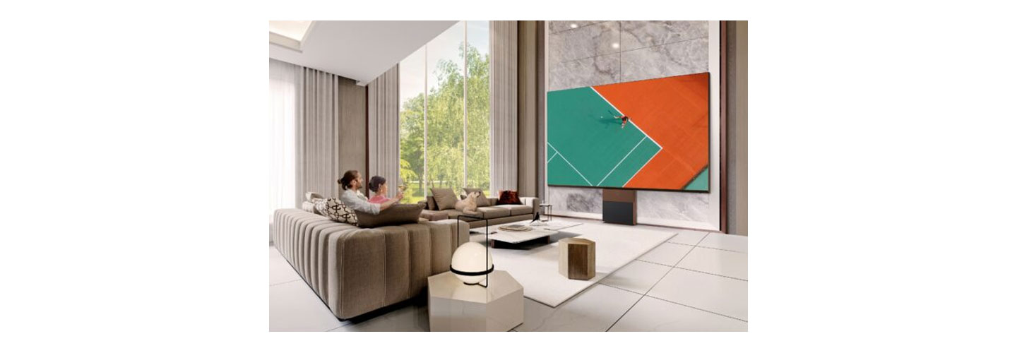 People watching sports games on LG MAGNIT in the living room