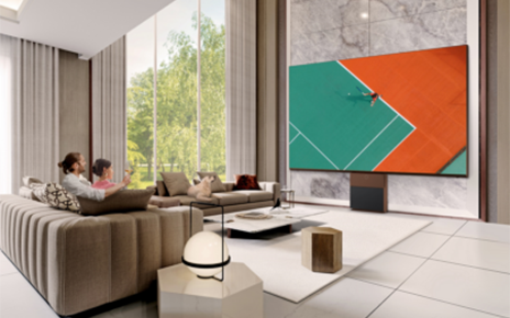People watching sports games on LG MAGNIT in the living room