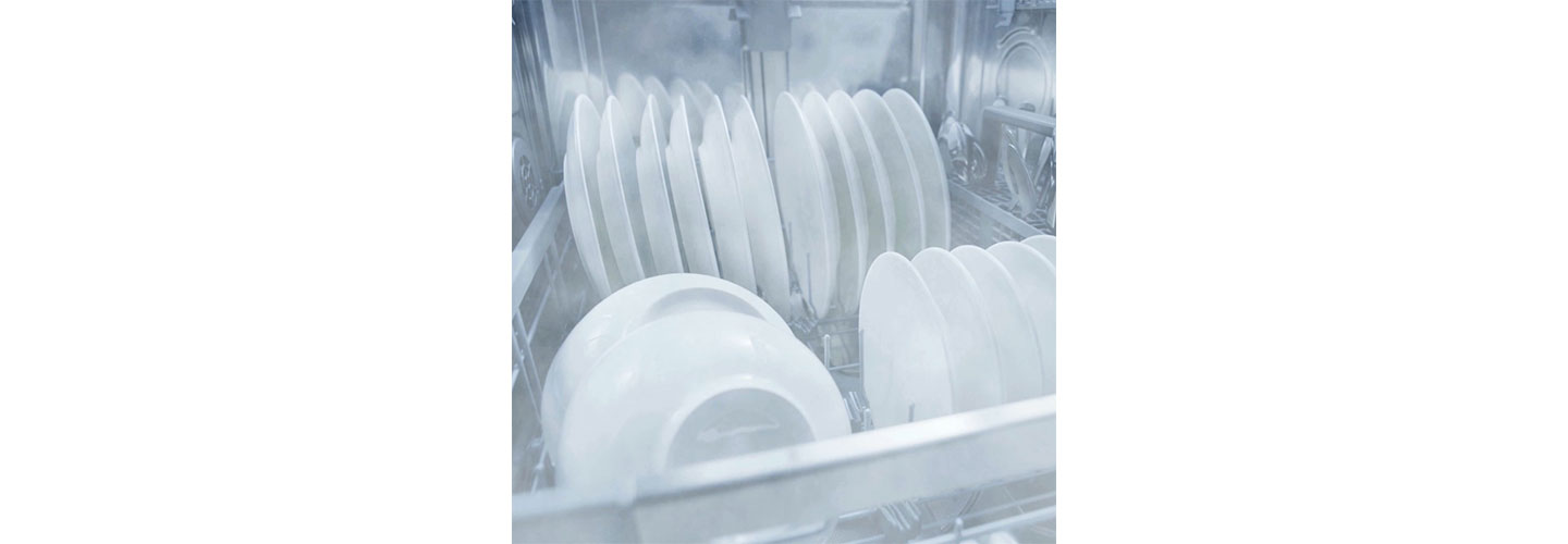 Dishes being washed inside the LG QuadWash™ dishwasher via LG's chemical-free EasyClean™ system