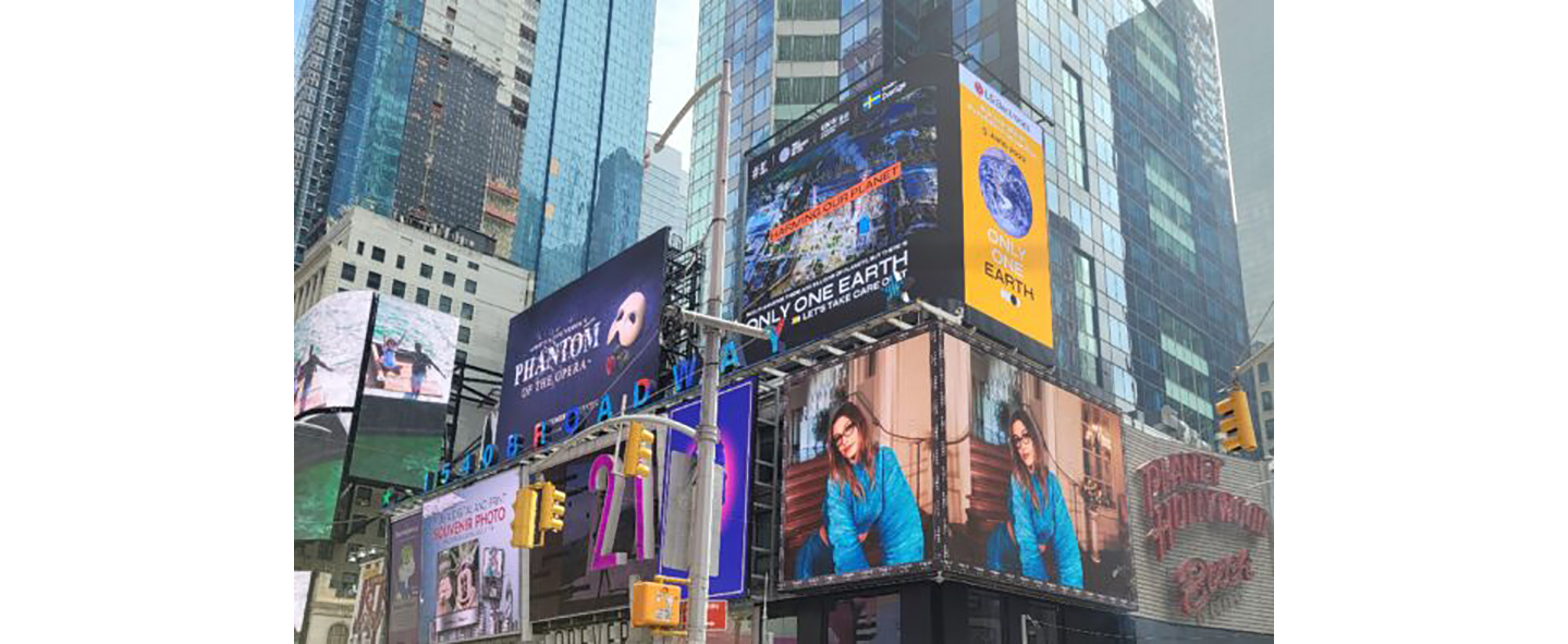 The overall view around LG's digital billboard in Time Square, New York displaying a video of LG's Only One Earth campaign 