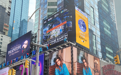 The overall view around LG's digital billboard in Time Square, New York displaying a video of LG's Only One Earth campaign 