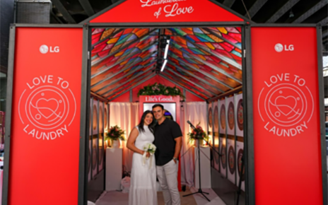 A photo of a couple standing inside a small built-in wedding venue