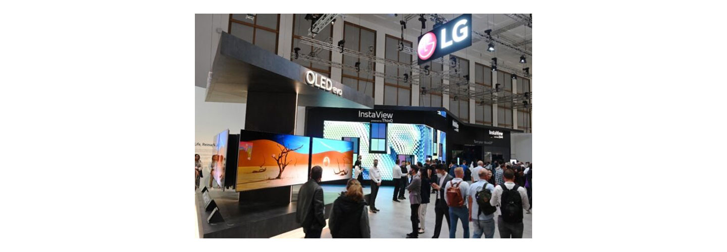 Many visitors walking around and taking a closer look at products showcased at LG Booth during IFA 2022