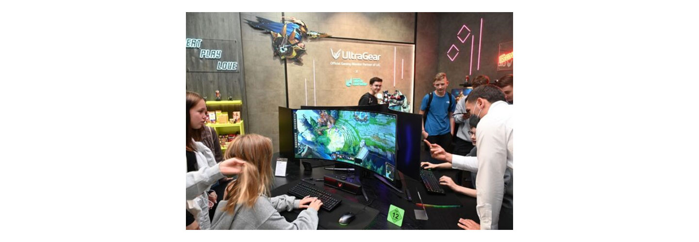 Part of the LG Booth at IFA 2022 where visitors are playing games on LG UltraGear Gaming monitors