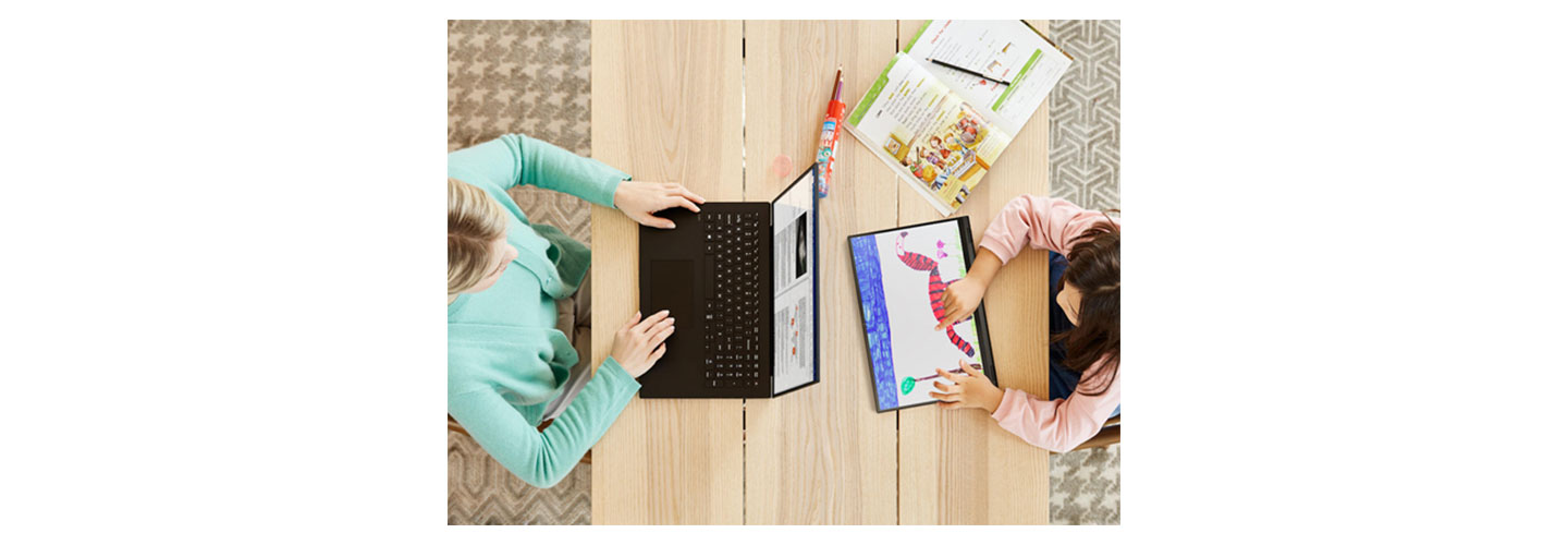 A woman using LG gram to do some work at her desk with her daughter who is drawing a picture of an animal on LG gram 2-in-1.