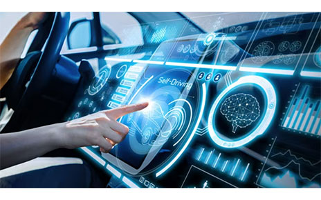 A driver touching the in-vehicle screen displaying a self-driving mode
