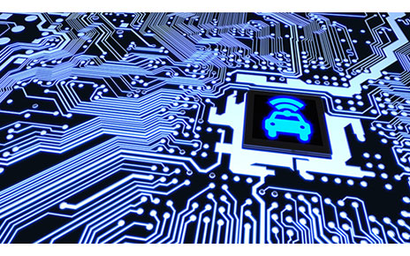 An illustration of a chip with a car icon on a circuit board 