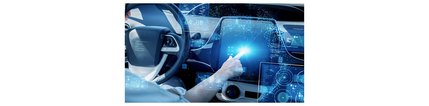 An illustration of a human finger touching a display on an automobile