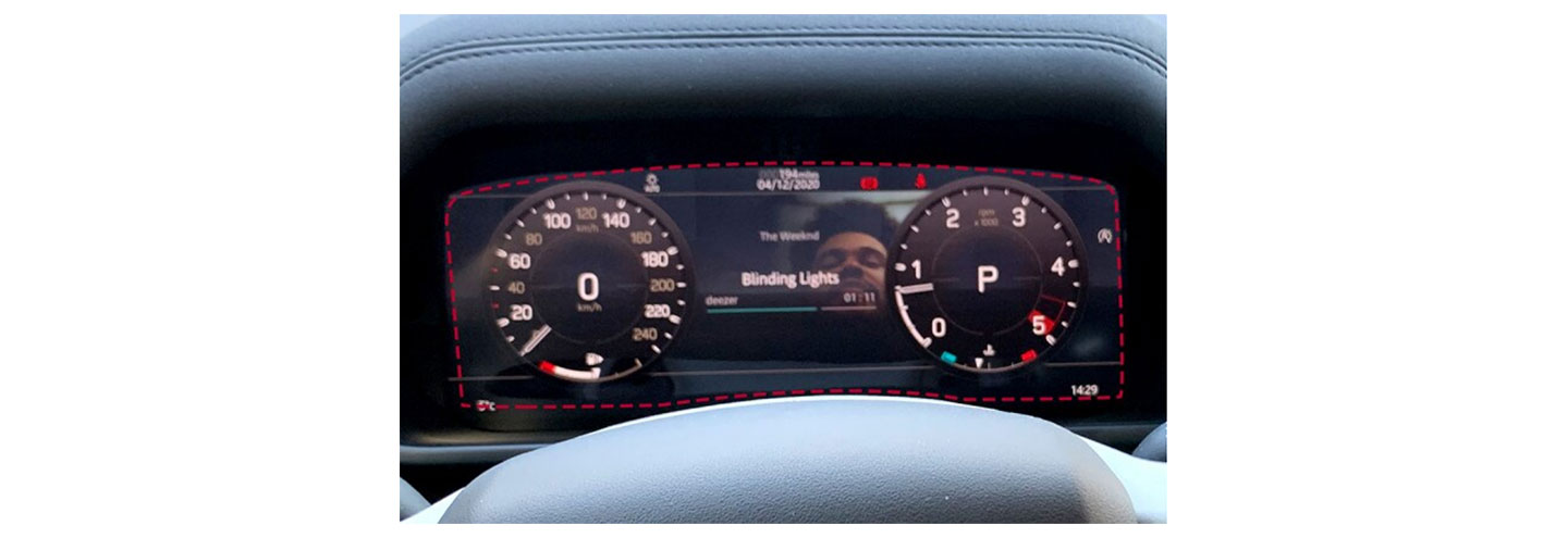 A closeup photo of a cluster screen installed on a vehicle
