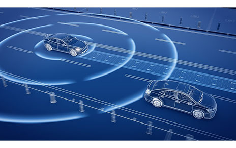 Two vehicles on the road with a camera sensor on