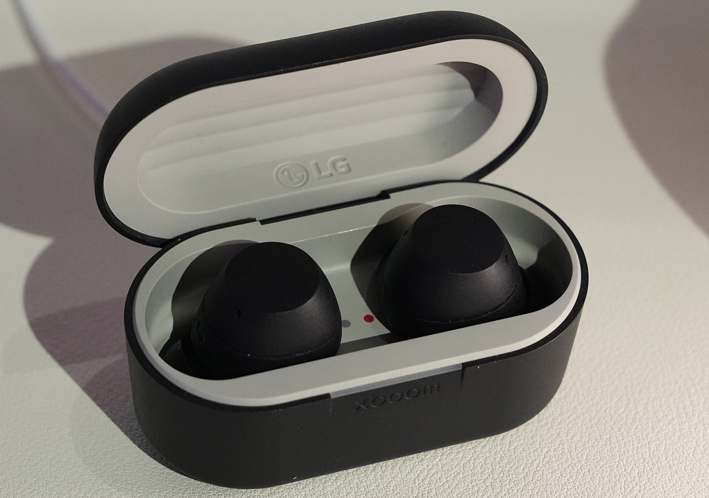 A photo of LG’s latest earbuds, the xboom Buds