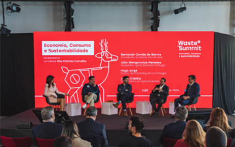 Waste Summit panel members having a discussion on stage at the Waste Summit.