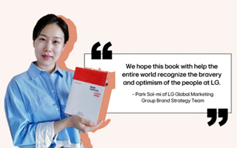 A picture of Park Sol-mi holding the LG Brand Book with a quote next to her