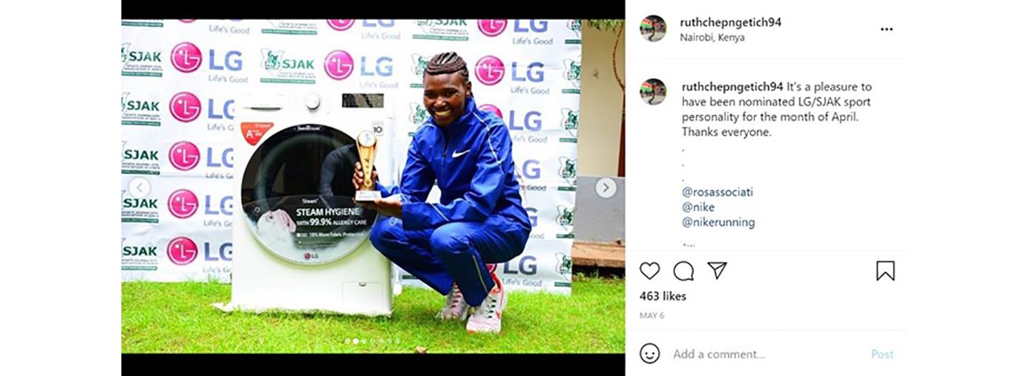 An Instagram post by Ruth Chepng’etich with a picture of her holding the trophy next to an LG washer