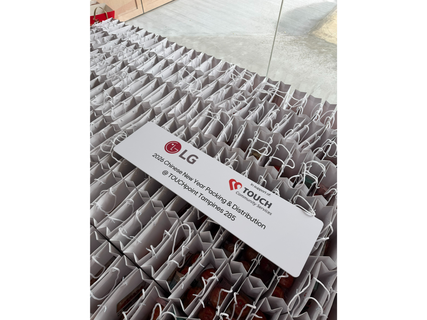 345 hampers are lined up before being given to residents across Tampines.