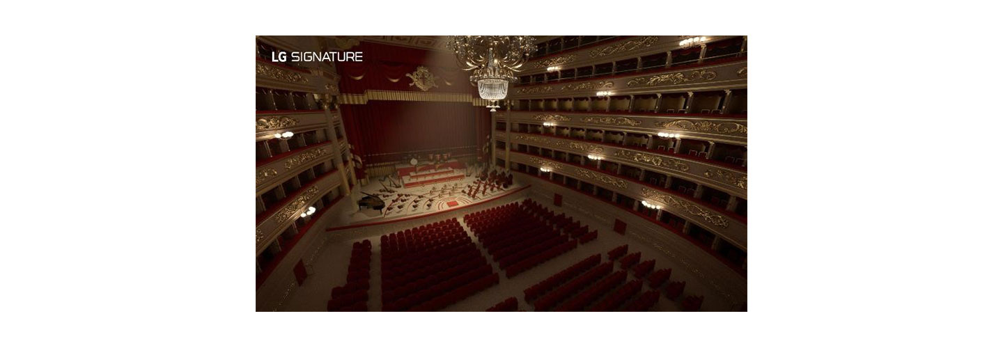 A picture of the stage and empty seating of the La Scala opera house taken from the back of the hall