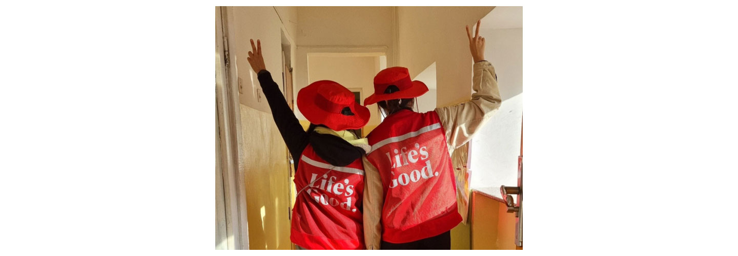 Two Life's Good volunteers posing together for a photo