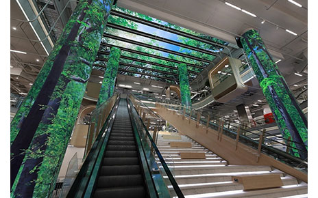 LG’s LED signage expressing images of a forest on the ceiling and pillars of Bangkok’s True Digital Park West.