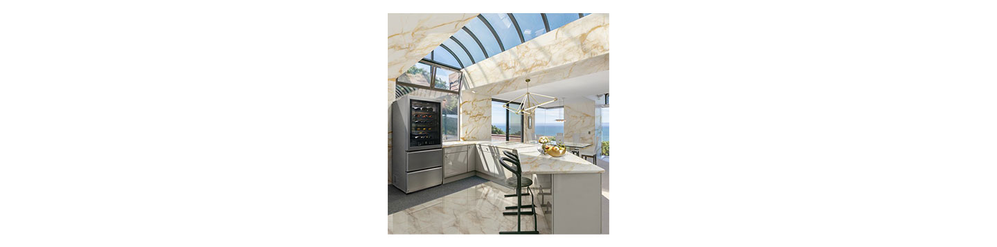 The textured steel façade of the LG SIGNATURE Wine Cellar invites you to turn its darkened InstaView glass transparent with two quick knocks to illuminate the contents, set against the stunning Calacatta marble, to bring a sense of the outdoors in.