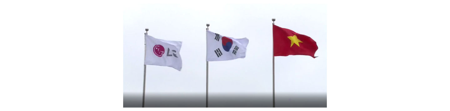 The three flags of LG, Korea and Vietnam hoisted above the LG Haiphong Campus