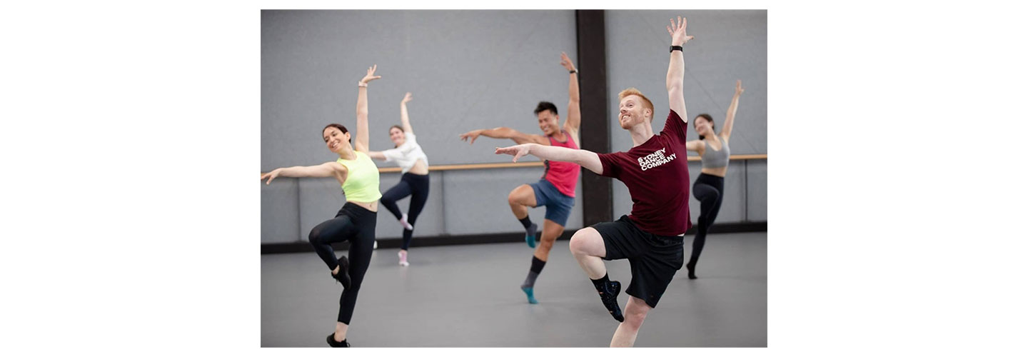 A photo of the Sydney Dance Company crew practicing