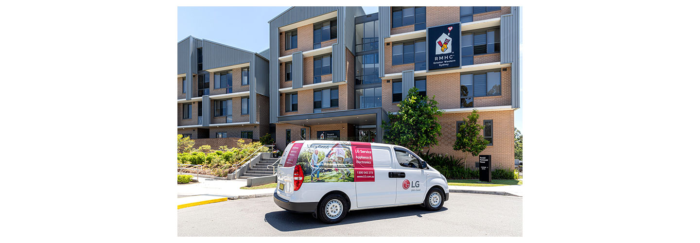 A photo of LG's van parked at the front of RMHC building to donate a few LG products
