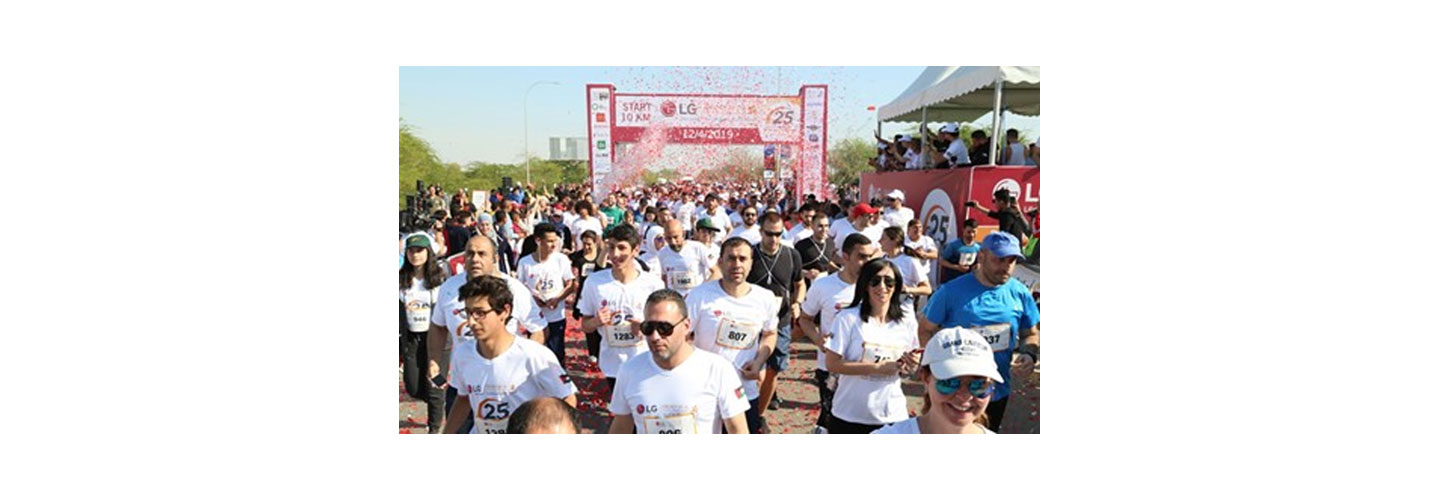 Hundreds of runners crossing the start line at the 2019 LG Dead Sea Half Marathon