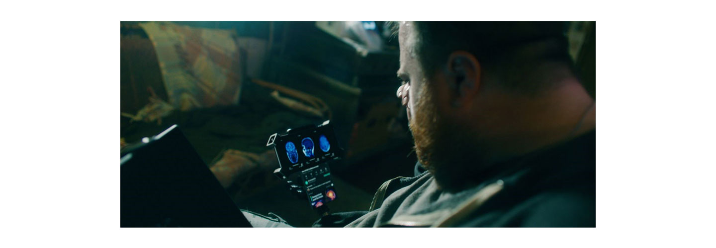  An actor carefully looking at the screen of LG Wing in Swivel Mode